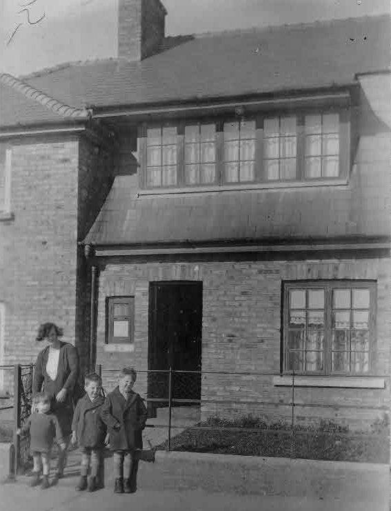 Emily Buckley nee Potter
with (L to R)
Nick, Jack & Phil Buckley
outside
11 St Aiden's Park Road, Marino.
Prepared from an originalprint