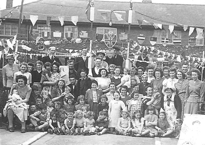 VE party 18 May 1945
Pawson Hodgson is next to the rightmost post
Marie,Eleanor,Winnie
are standing on the right
with the dog